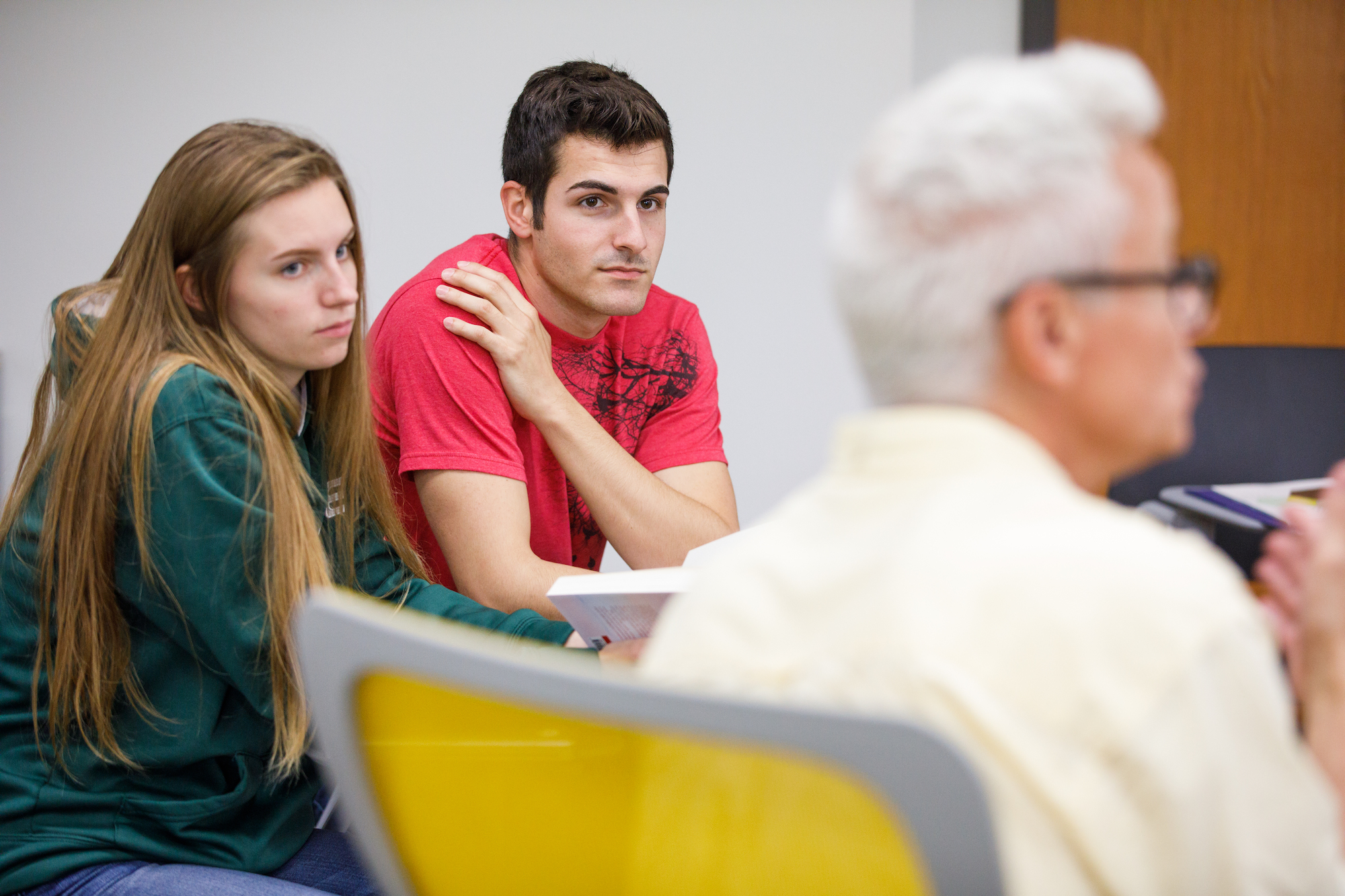 Students participating in a classroom discussion.