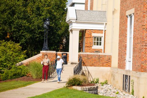 Two students leaving the Stockwell Library.