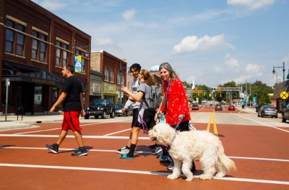 Members of the community crossing South Superior Street.