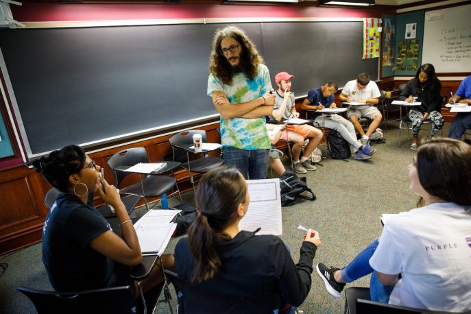 Albion College students participating in a discussion in a classroom