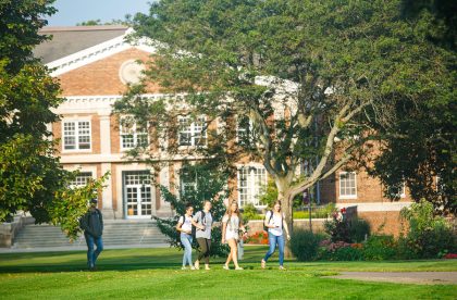 Albion College students walking across campus.