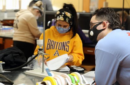 Two Albion College students working together in a lab