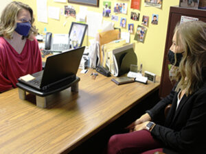 Dr. Vicki Baker (left) and an Albion College student