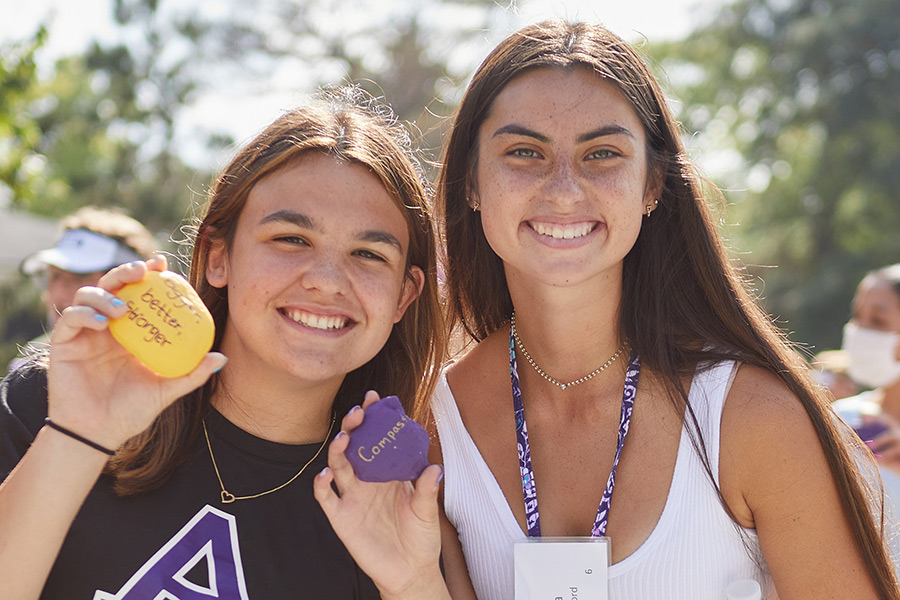 Two Albion College students on the Quad after 2021 Matriculation.