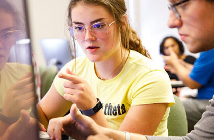 Albion College students collaborate in class.