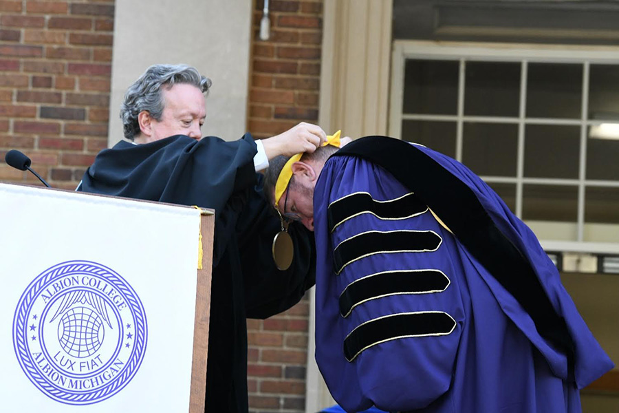 Michael Harrington, '85, and Dr. Mathew Johnson