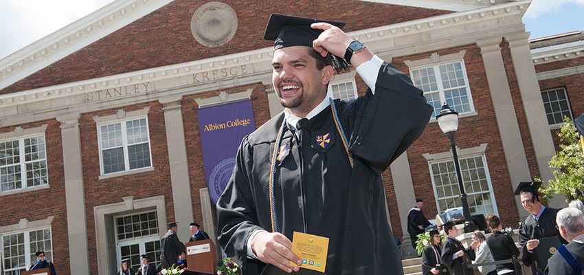 A student in his cap and gown.