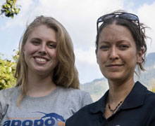 Two people smiling at the camera.