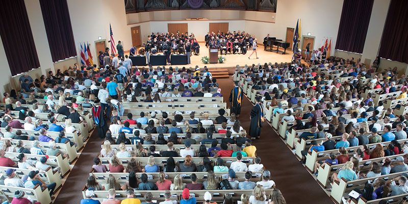 Students sitting in Goodrich Chapel.