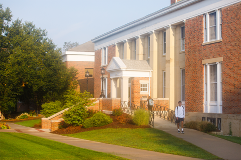 Students walking into and out of Stockwell Memorial Library.