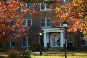 The exterior of Vulgamore Hall in the fall.