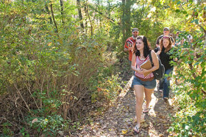 Students walking on a trail.