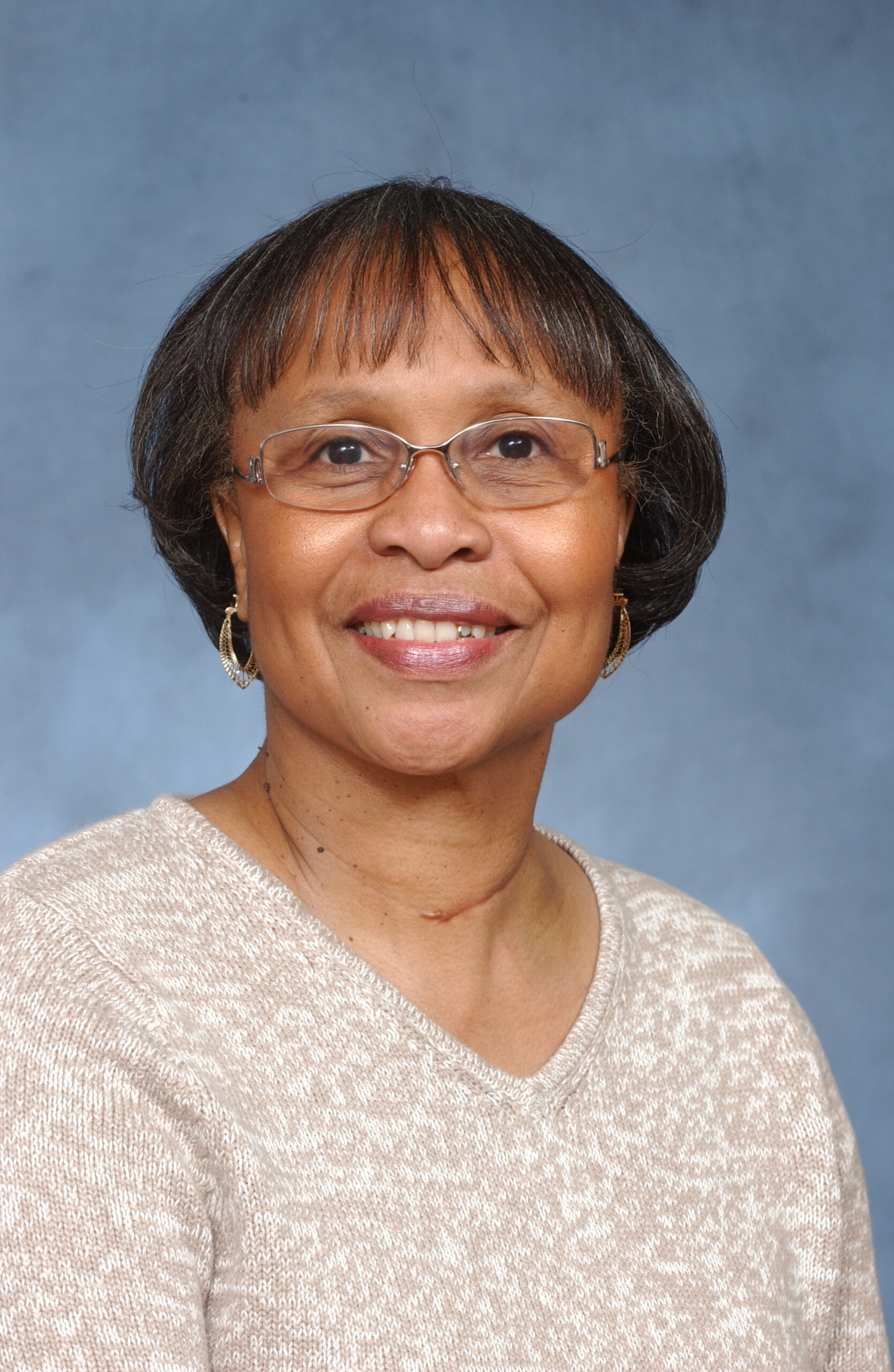 A professional headshot of Mae Ola Dunklin.