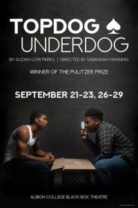 TopDog Underdog poster featuring two cast members, one holding a card up to the other.