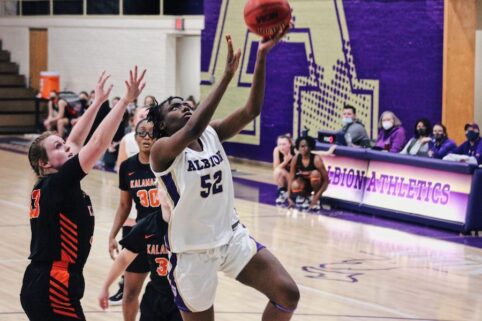 A member of the women's basketball team on the court.