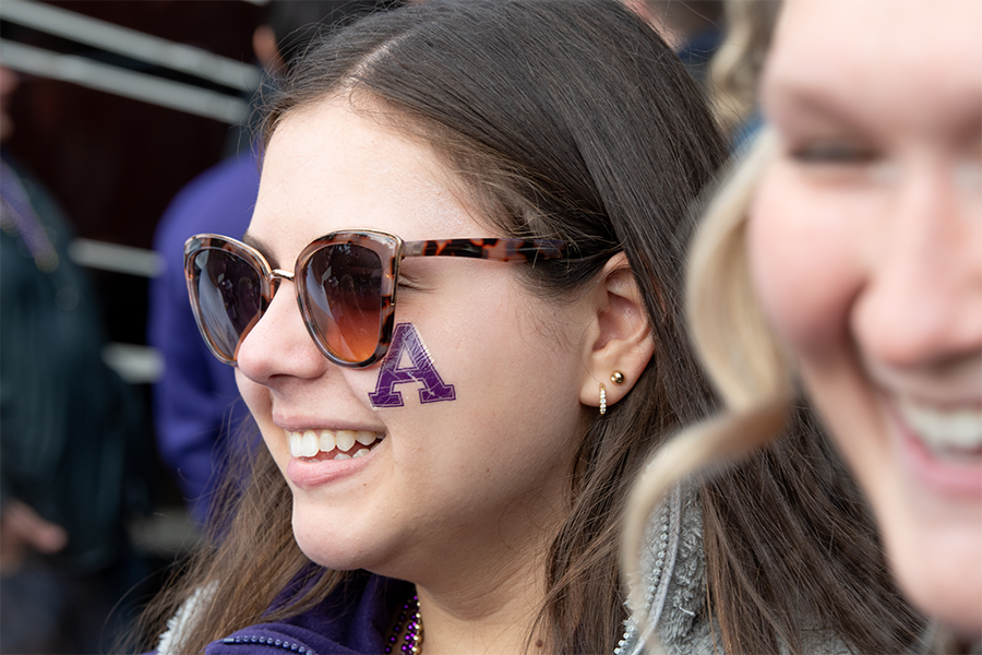 A student with an Albion "A" painted on her face.