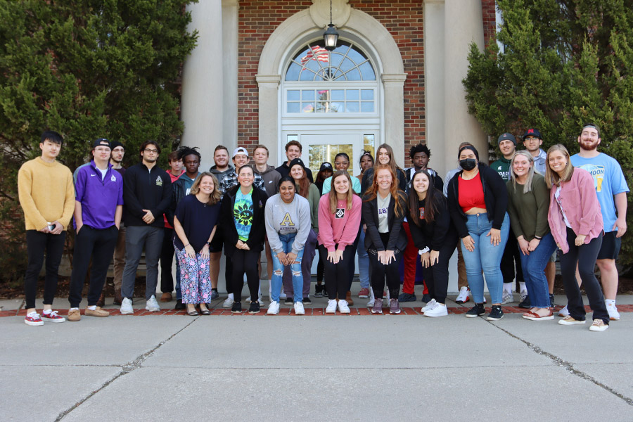 Dr. Vicki Baker (front row, left) and her Albion College Human Resource Management students outside Robinson Hall.