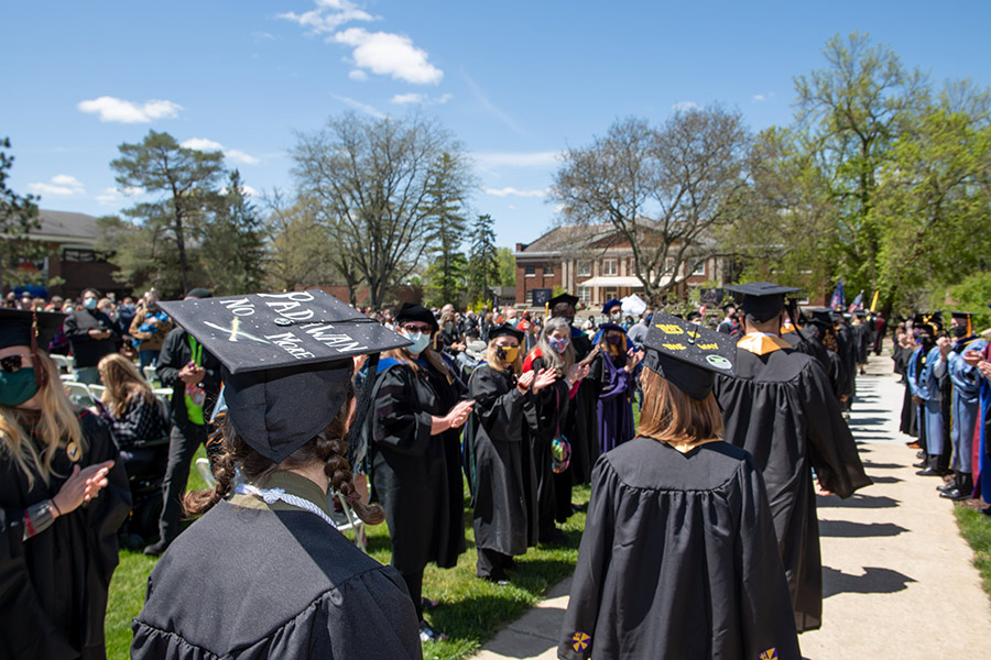 Students in regalia at commencement.