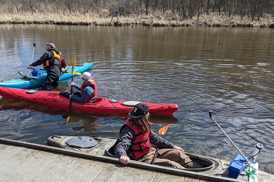 Students in canoes on the Kalamazoo River.