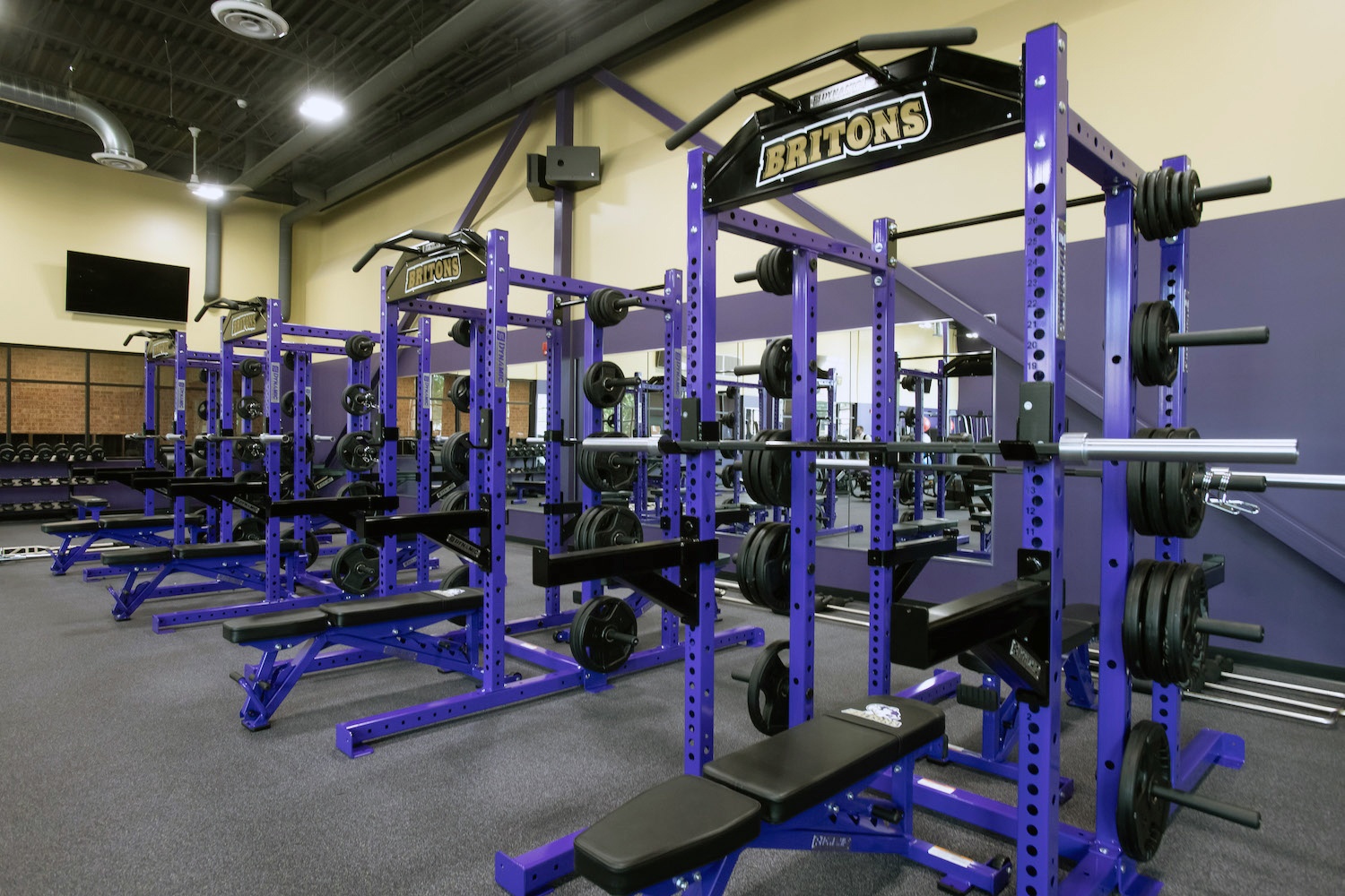 Power racks inside the completed Dow Recreation and Wellness Center.