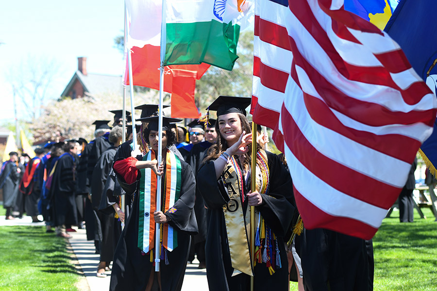 Flag bearers at Albion College Commencement 2022.