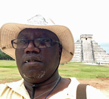A headshot of Ola Olapade.